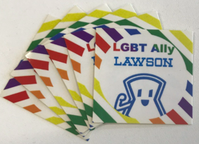 Handing out stickers to support LGBTQ to persons who wish them