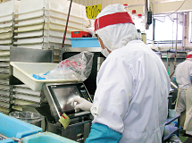 Curbing waste by carefully measuring raw materials at a rice dish factory